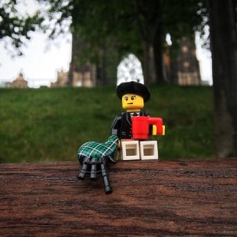 My one photo from Edinburgh. A solitary Scot with his bagpipes sitting in the rain in Princes Street Gardens.