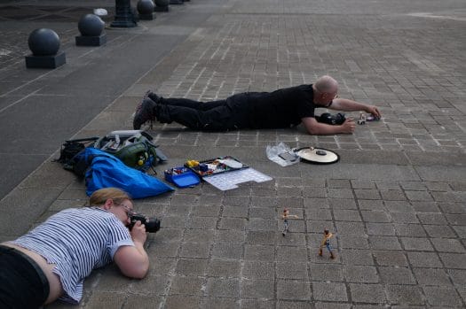 Toy photographers not taking a nap