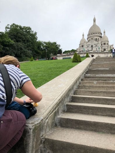 Playing with toys in front of the Sacre Coeur