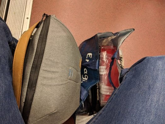 My camera bag and grocery bag in the Parisian subway